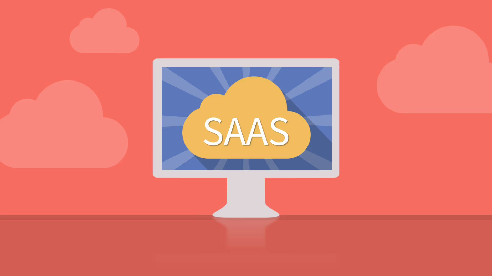 A graphic of a desktop with the word 'SAAS' on it