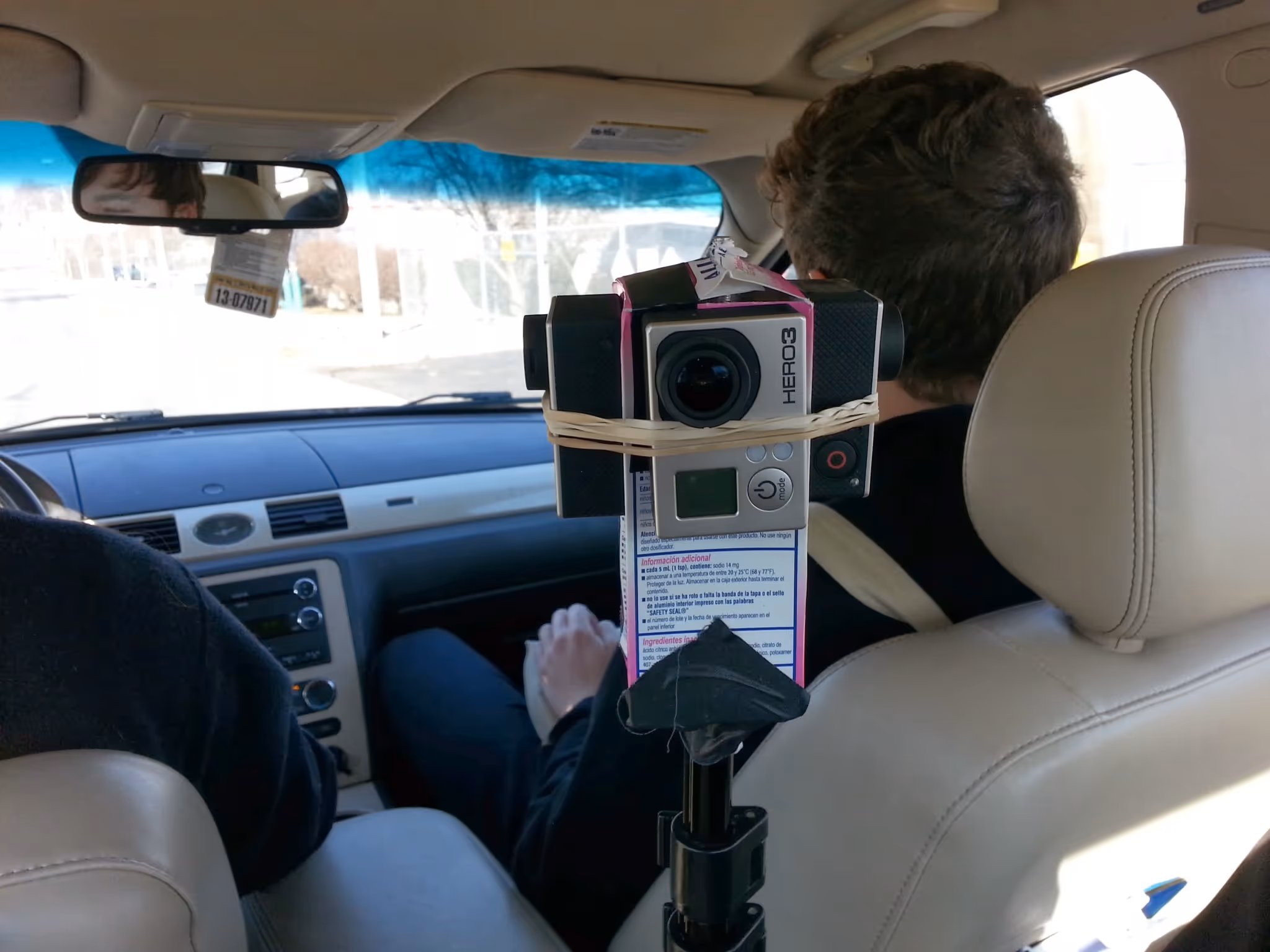 Four GoPros on a tooth paste box