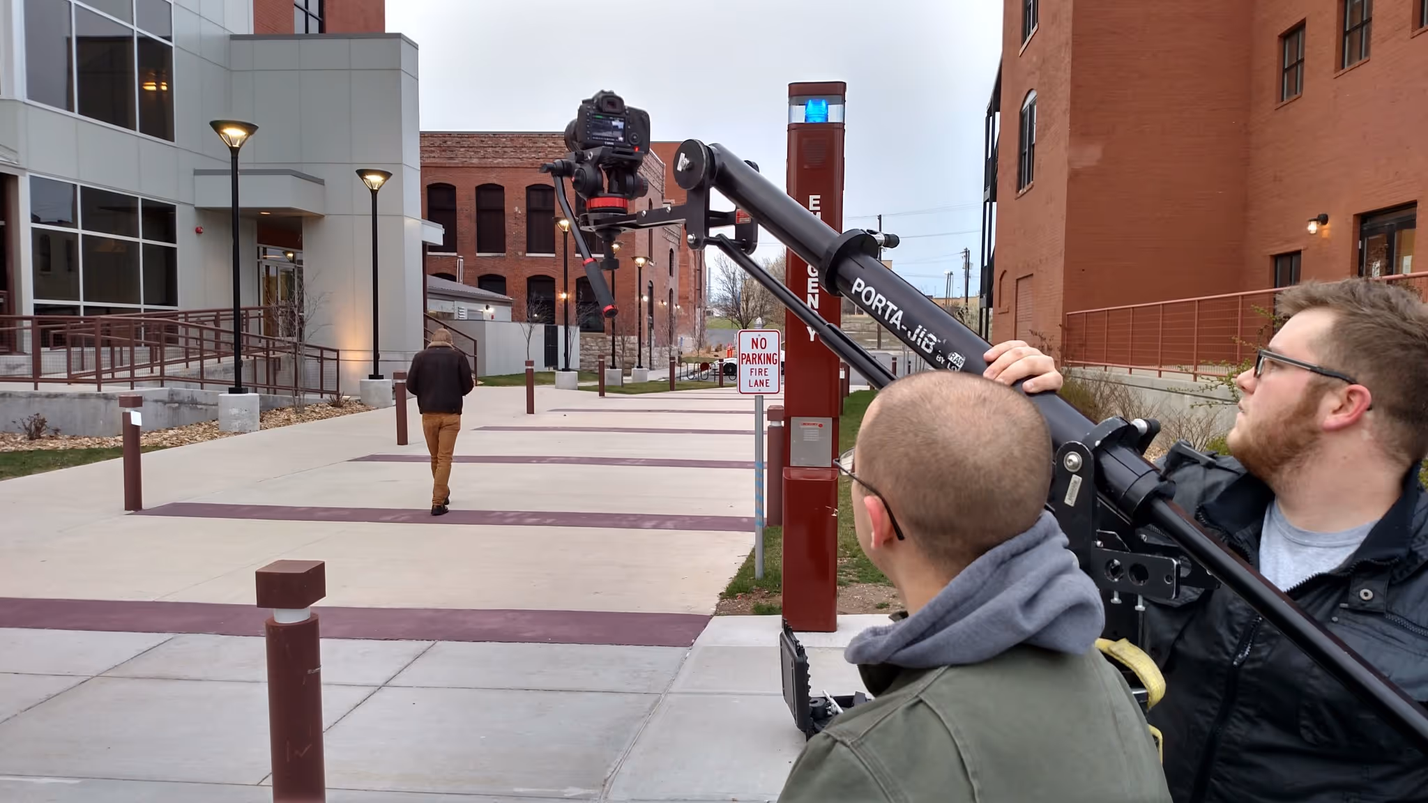 A camera jib is used to film a scene