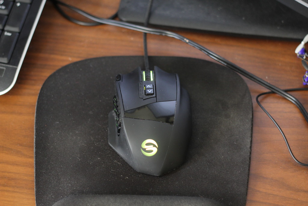 A big computer mouse with 12 buttons on the side