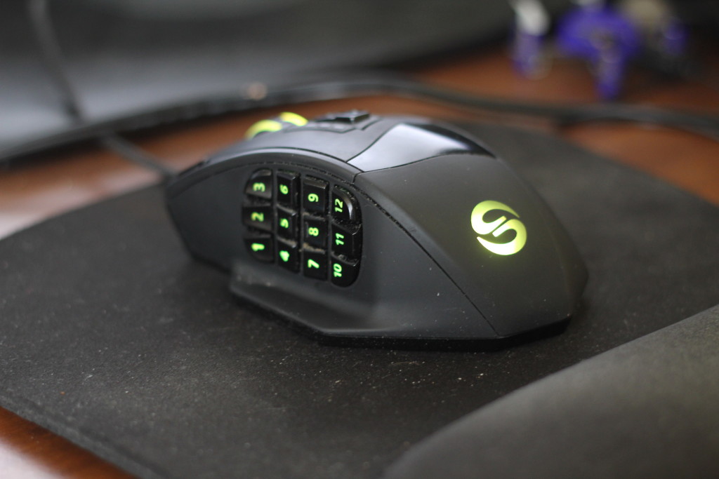 A computer mouse with 12 buttons on the side