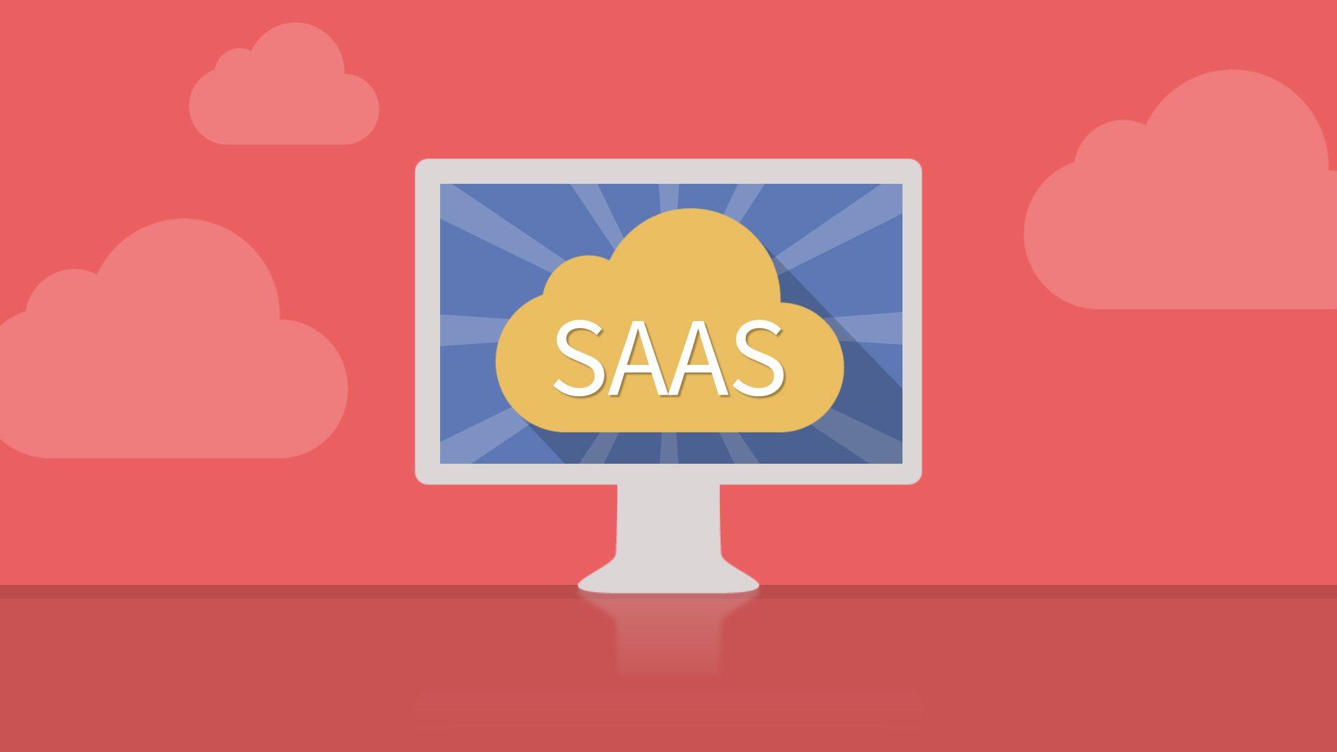 A graphic of a desktop with the word "SAAS" on it